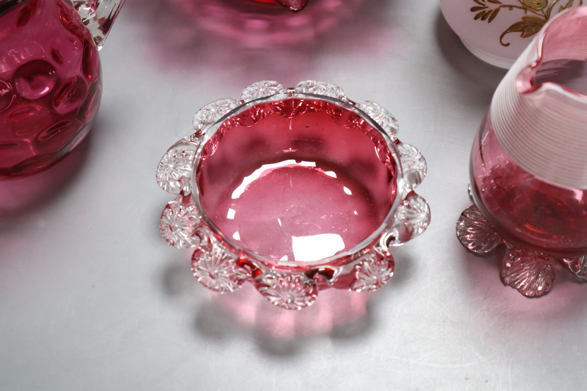 A quantity of mixed cranberry glass